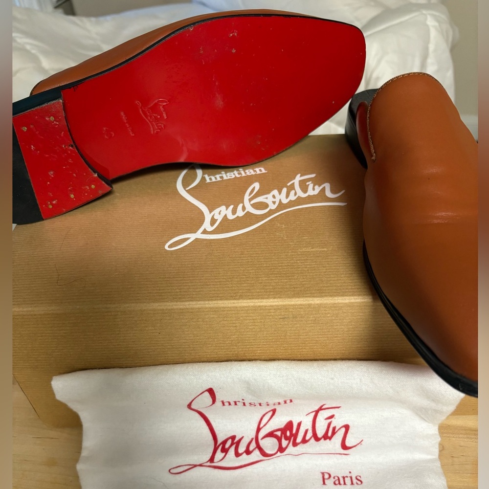 Christian Louboutin Tan Leather slip on shoes with shoe box and CL bag.